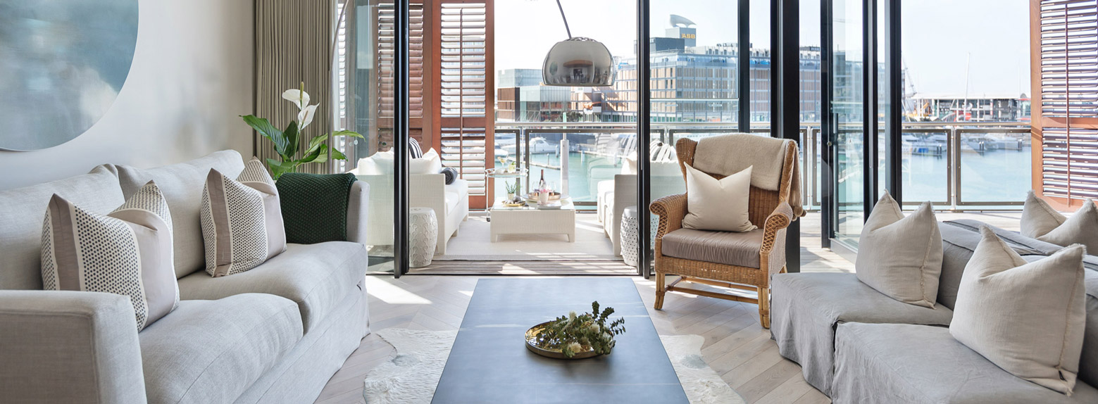 Luxury designer home with cowhide rug, marble coffee table, Arco floor lamp & Indoor Outdoor flow | Point Residence Interior
